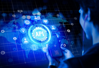 Person holding smartphone with glowing API interface over a world map