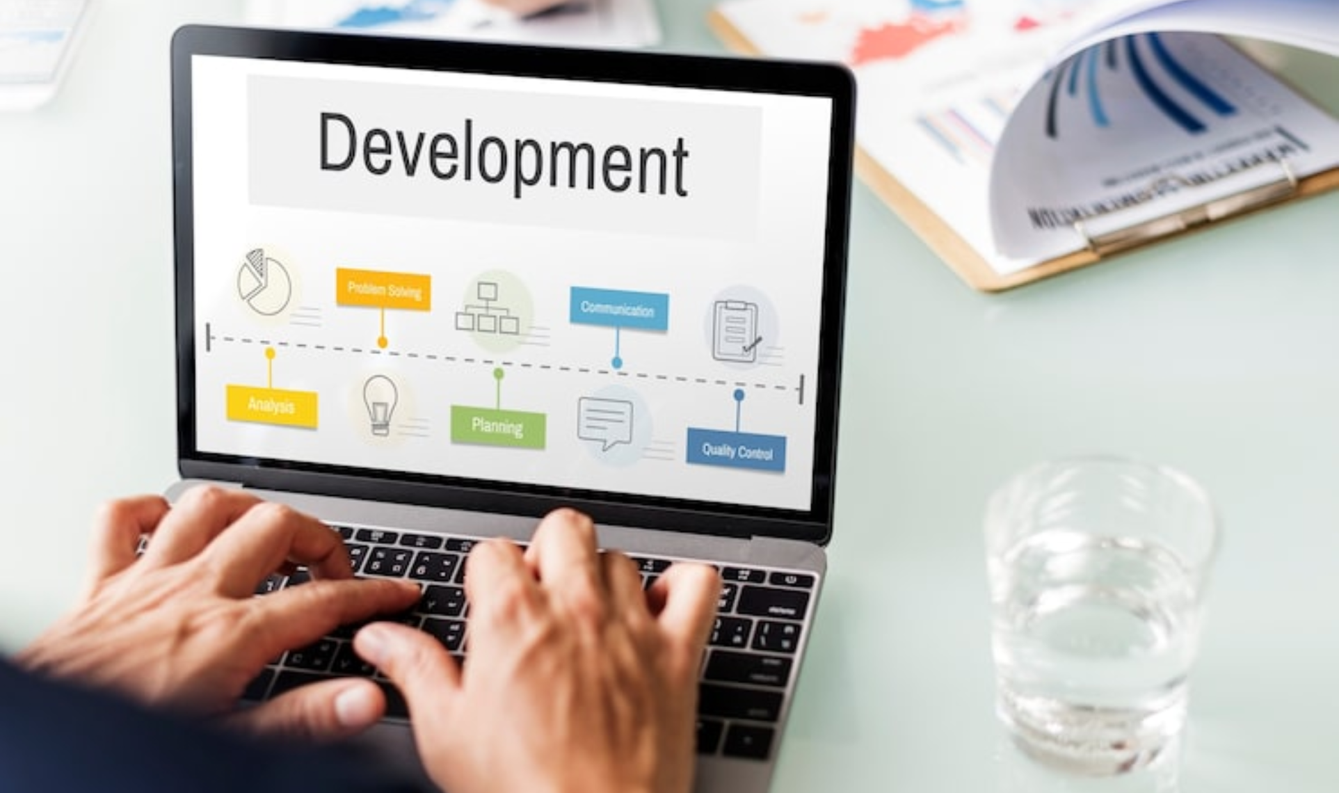 Four professionals collaborating in a modern office lounge