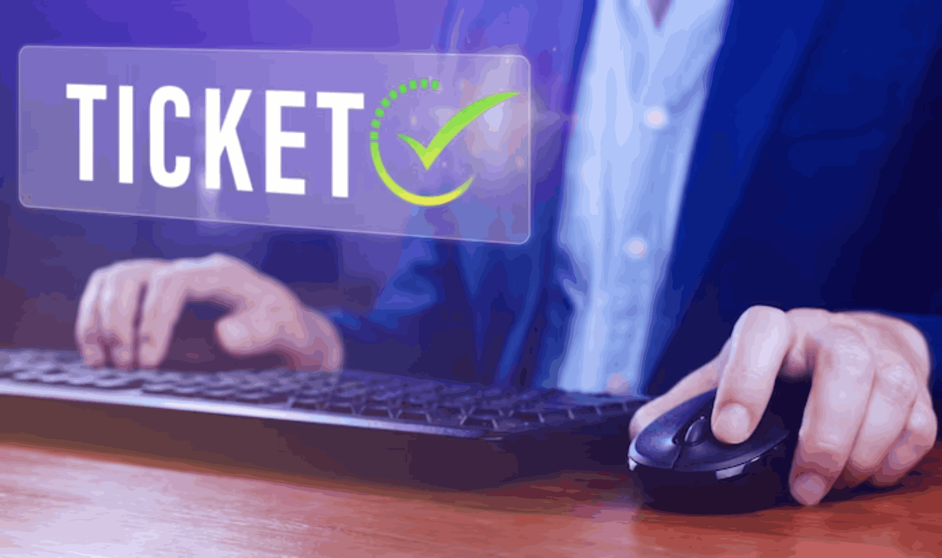A close-up of a person using a computer keyboard and mouse with a digital 'TICKET' overlay and a green checkmark, representing Ticketing & Escalation.